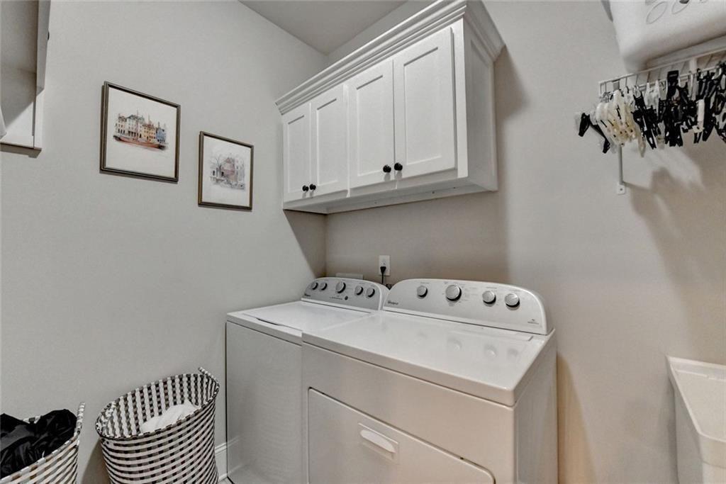 919 Fields Chapel Road Canton, GA 30114 - Photo 21 of 58 a utility room with dryer and washer