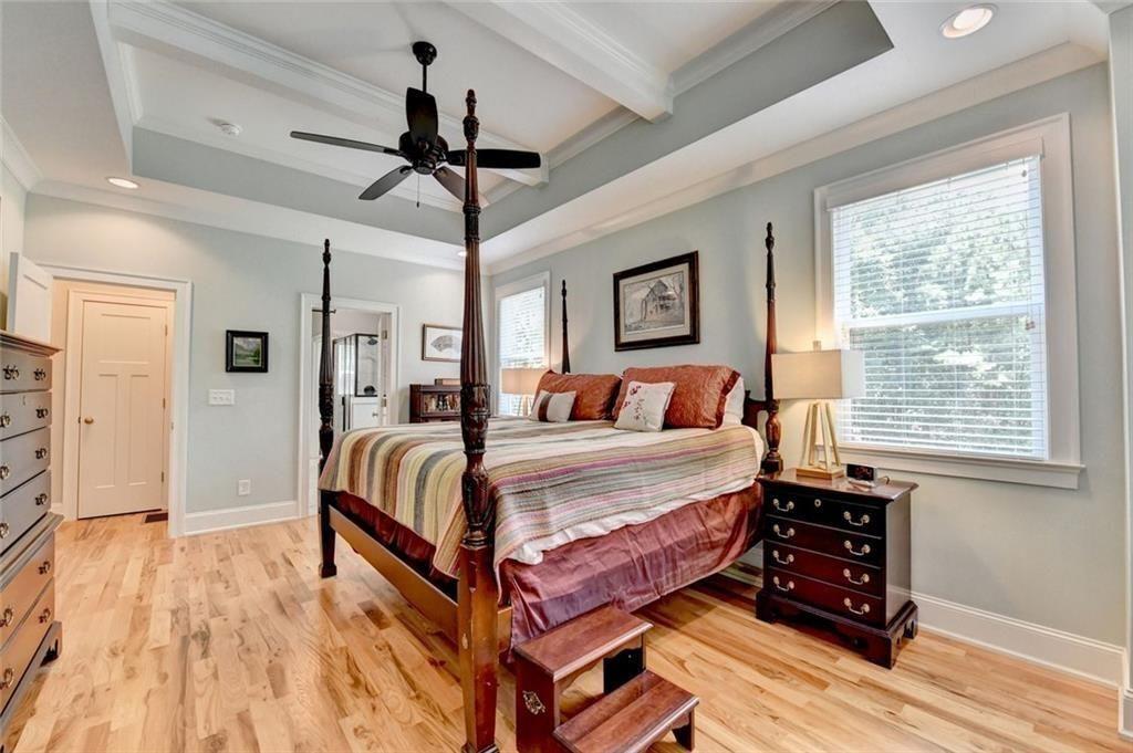 919 Fields Chapel Road Canton, GA 30114 - Photo 25 of 58 a bedroom with a bed and wooden floor