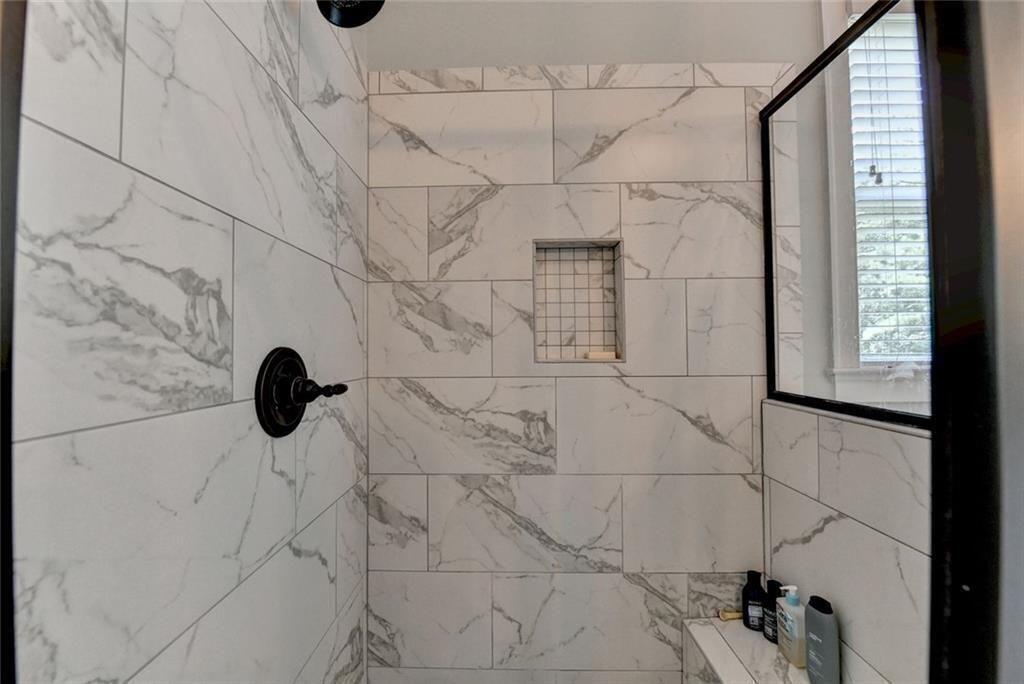 919 Fields Chapel Road Canton, GA 30114 - Photo 30 of 58 a bathroom with a shower