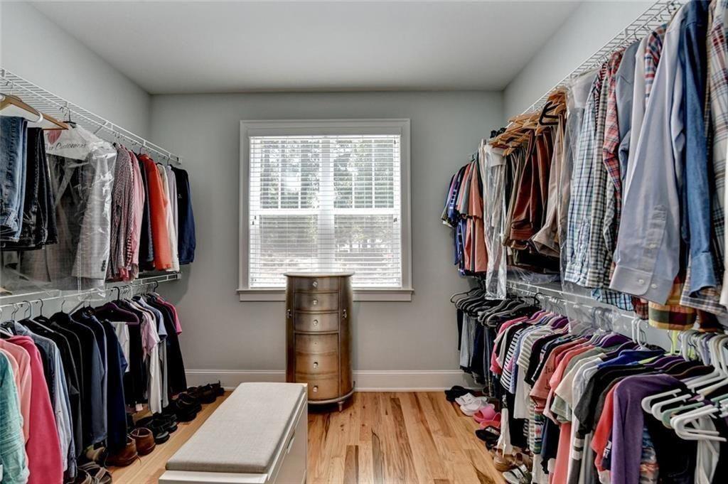 919 Fields Chapel Road Canton, GA 30114 - Photo 32 of 58 a view of walk in closet with clothes and shoes