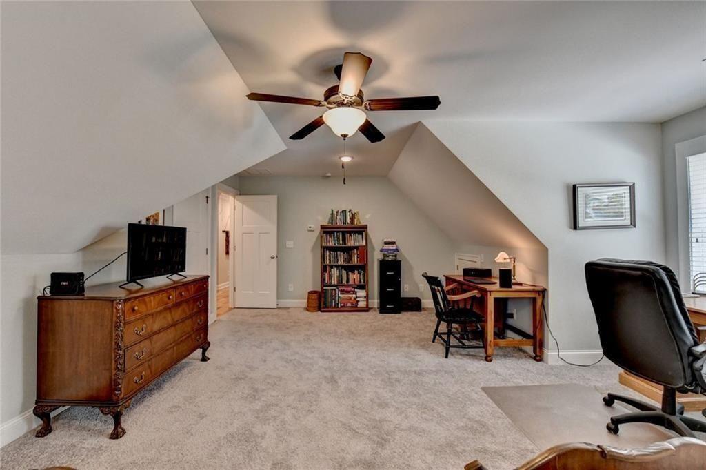 919 Fields Chapel Road Canton, GA 30114 - Photo 44 of 58 a view of a livingroom with workspace and a window
