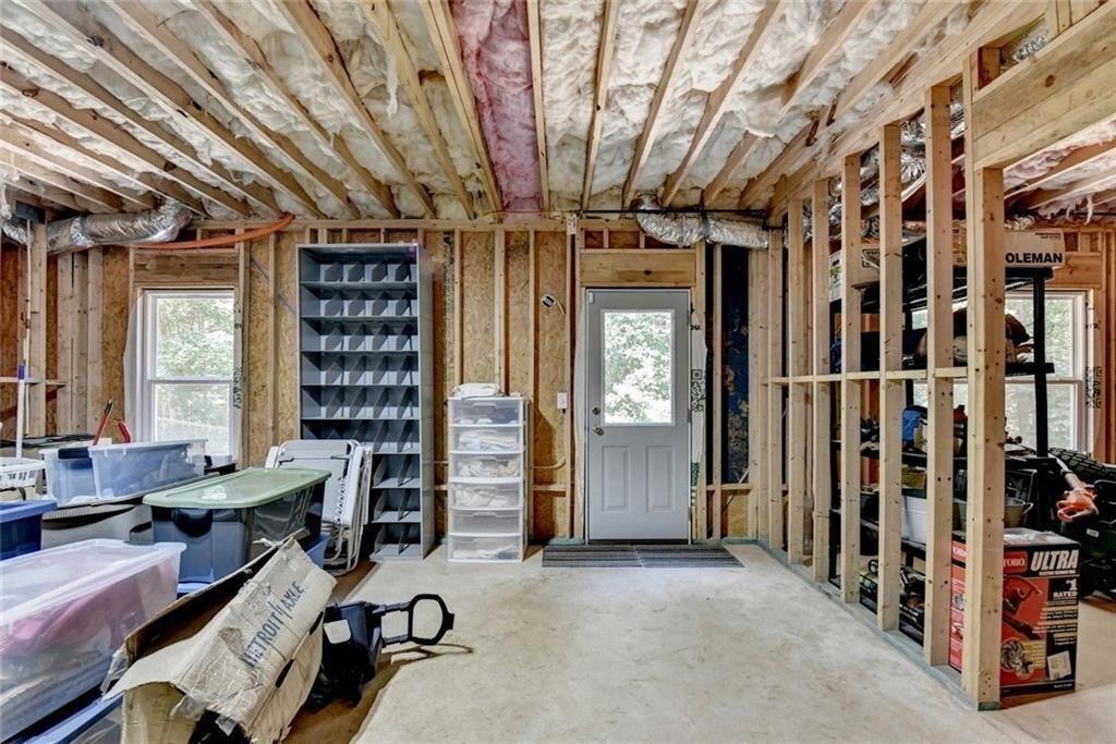 919 Fields Chapel Road Canton, GA 30114 - Photo 47 of 58 a view of a livingroom with workspace and a window