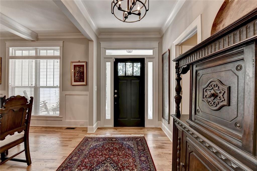 919 Fields Chapel Road Canton, GA 30114 - Photo 5 of 58 a bedroom with a bed and wooden floor