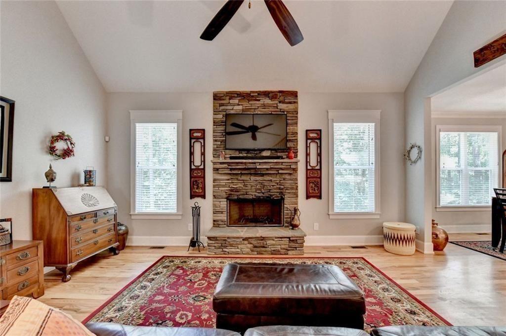 919 Fields Chapel Road Canton, GA 30114 - Photo 10 of 58 a living room with furniture fireplace and window