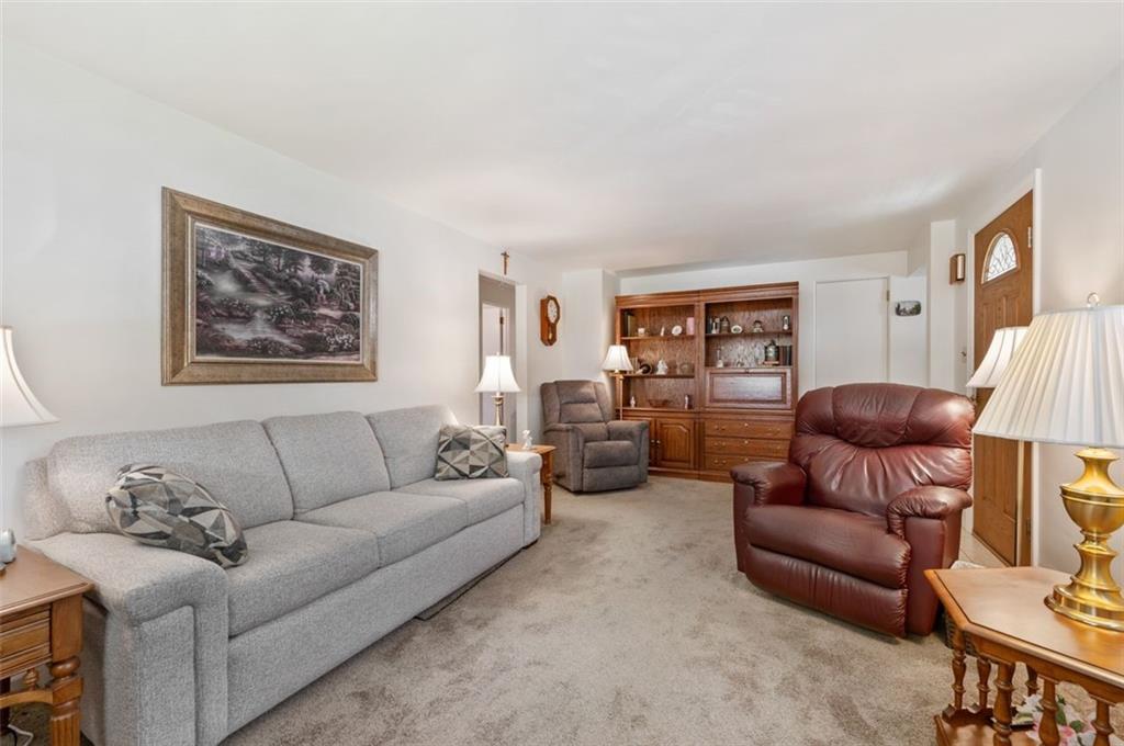 172 Eileen Drive Pittsburgh, PA 15227 - Photo 5 of 21 a living room with furniture and a large window