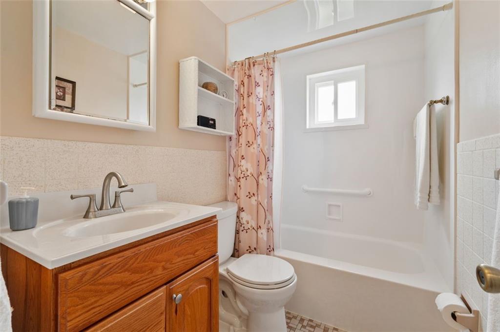 172 Eileen Drive Pittsburgh, PA 15227 - Photo 7 of 21 a bathroom with a sink toilet and shower