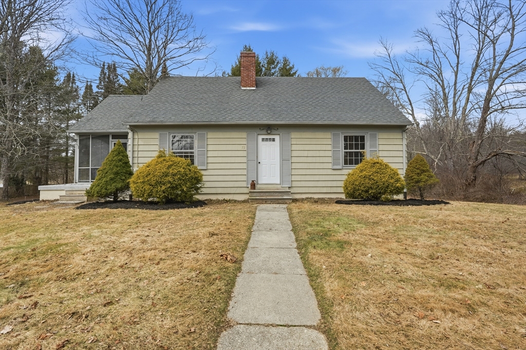 75 North Road Hampden, MA 01036 - Photo 2 of 42 a front view of a house with a yard and garage