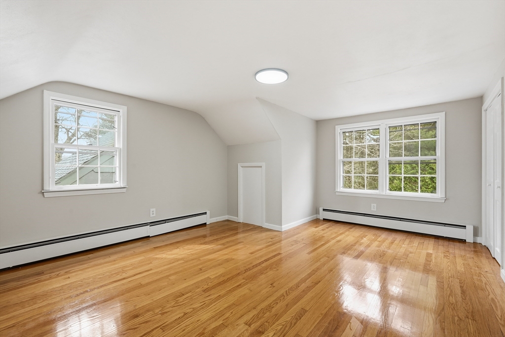75 North Road Hampden, MA 01036 - Photo 26 of 42 a view of an empty room with wooden floor and a window