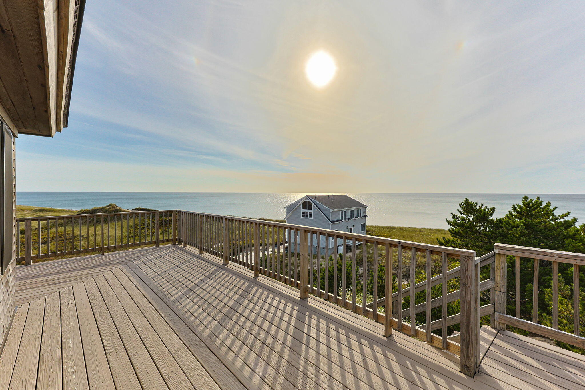 52 Corn Hill Road Truro, MA 02666 - Photo 43 of 74 a view of balcony with wooden floor and ocean view