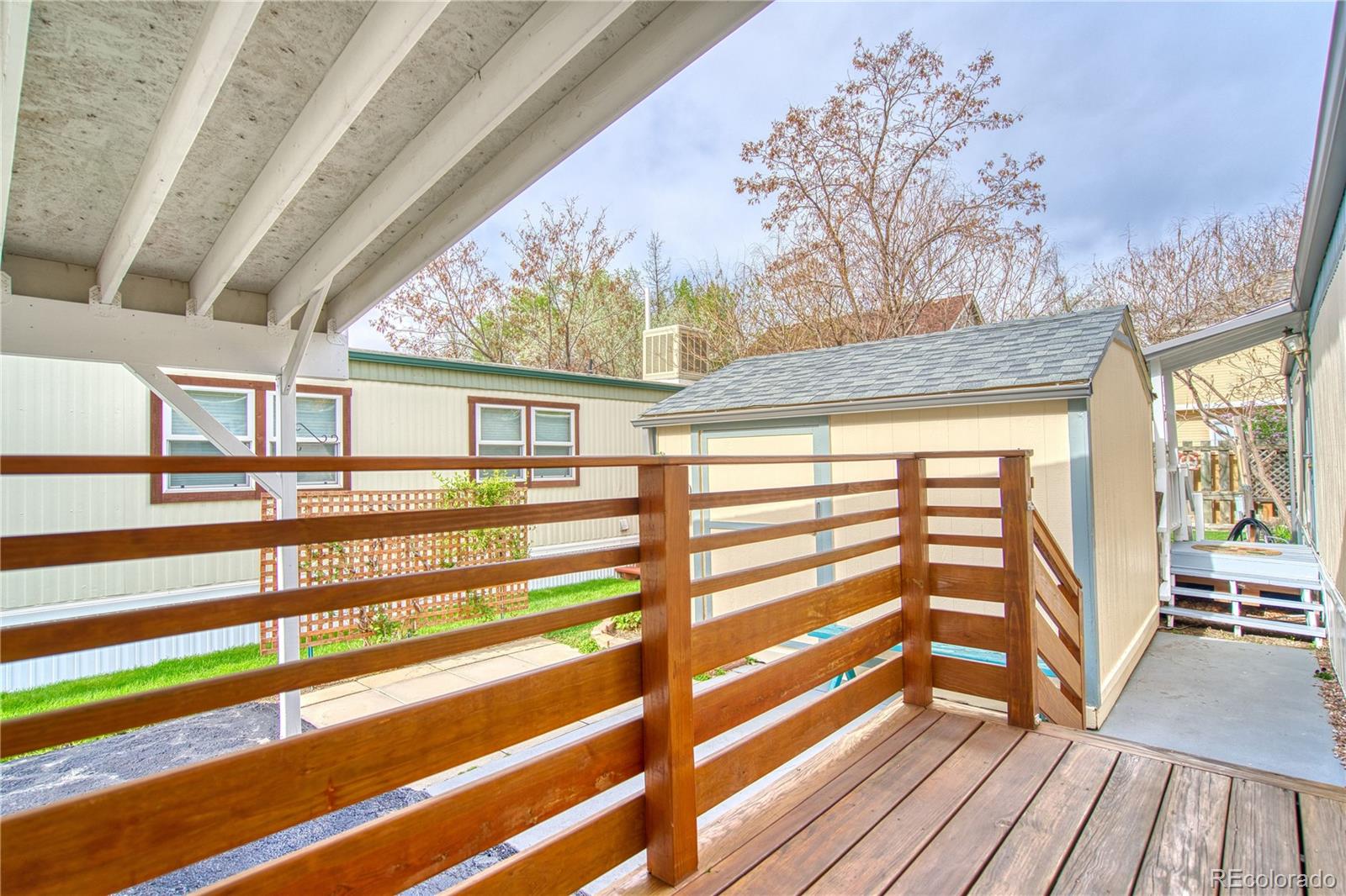 5000 Butte Street Boulder, CO 80301 - Photo 12 of 16 a view of porch with wooden floor and iron stairs