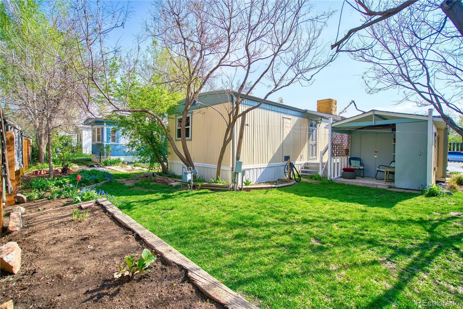 5000 Butte Street Boulder, CO 80301 - Photo 13 of 16 a view of backyard with a garden and entertaining space