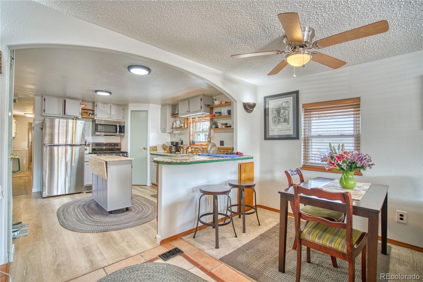 5000 Butte Street Boulder, CO 80301 - Photo 2 of 16 a kitchen with a dining table and chairs