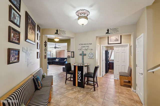 a bedroom with furniture and a window