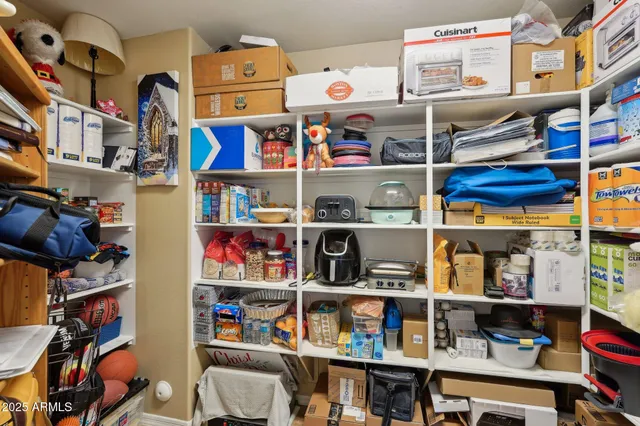 a bathroom with a double vanity sink mirror and double