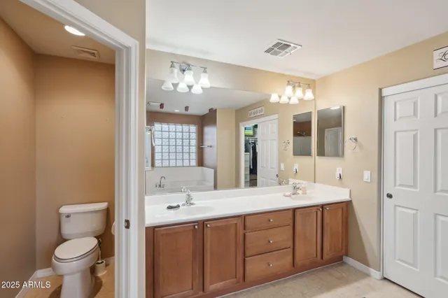 a room with lots of furniture and a large window