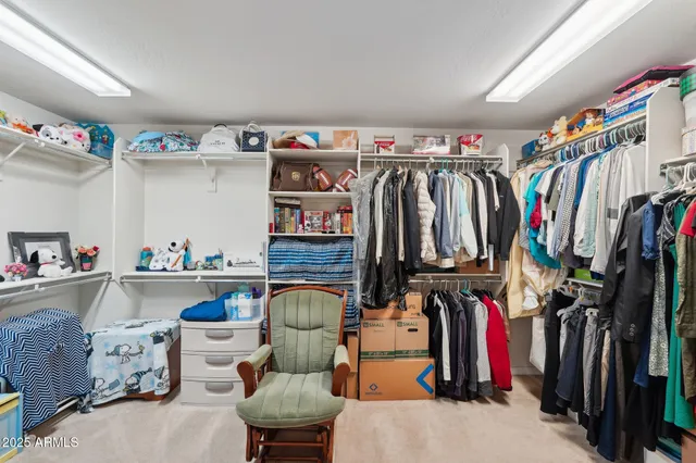 a view of hallway with wooden floor and front door