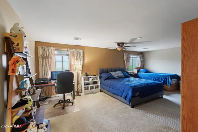 a bathroom with a shower curtain and a sink