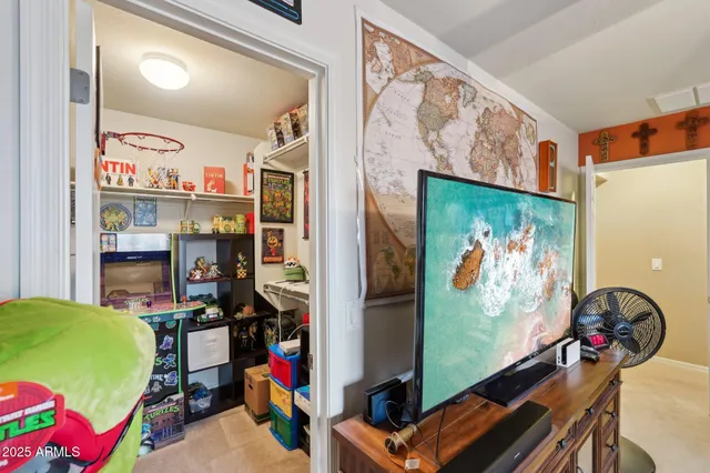 a view of a patio with table and chairs a barbeque with wooden floor