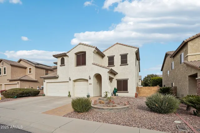 a front view of a house with an outdoor space