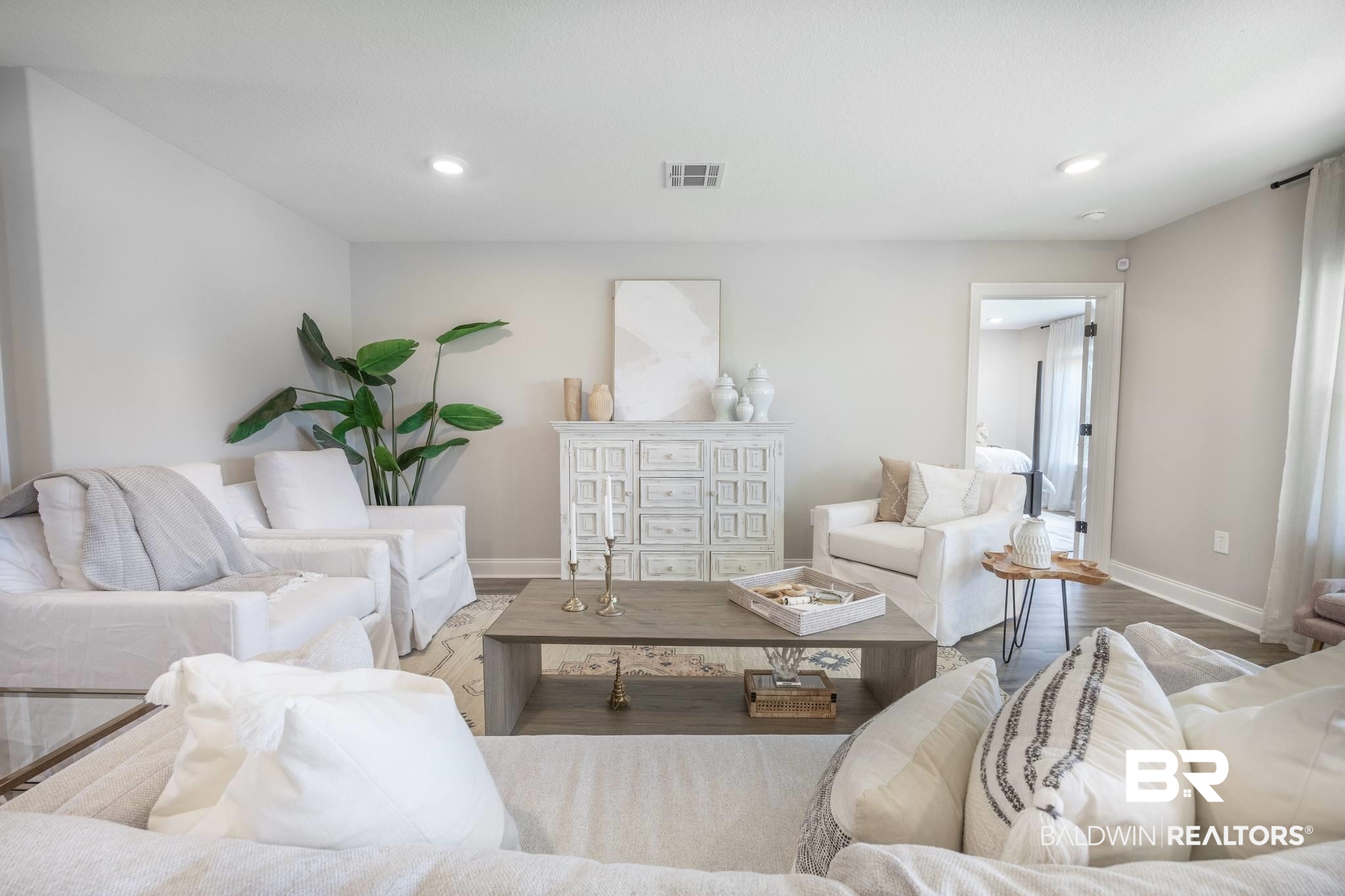 12918 Flanagan Street Elberta, AL 36530 - Photo 18 of 33 Spacious living area featuring light-toned walls, recessed lighting, and wood-finish flooring