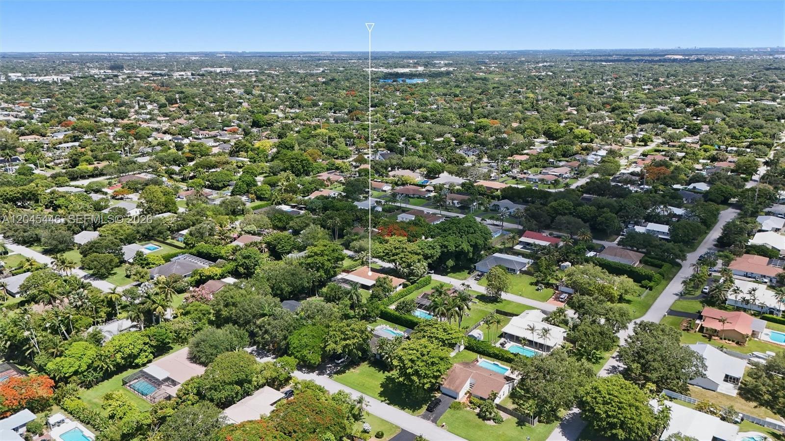 8440 Southwest 180th Street Palmetto Bay, FL 33157 - Photo 47 of 54 a view of a city with lush green forest