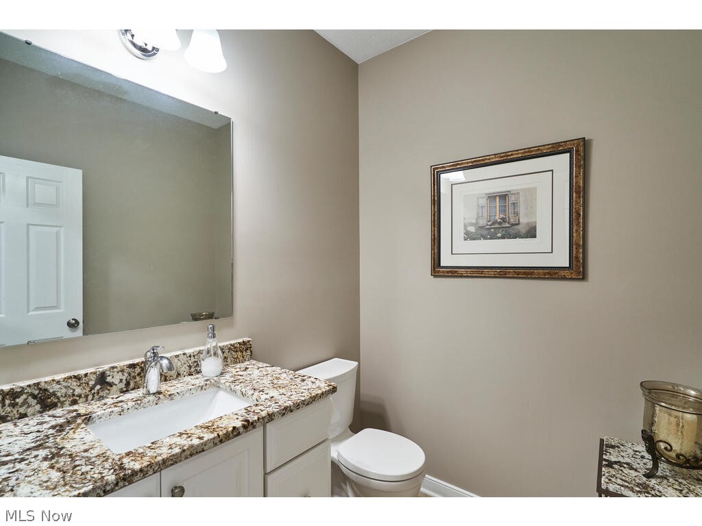726 Sunridge Road Fairlawn, OH 44333 - Photo 6 of 28 Half bath located in hall off the kitchen, dining room area