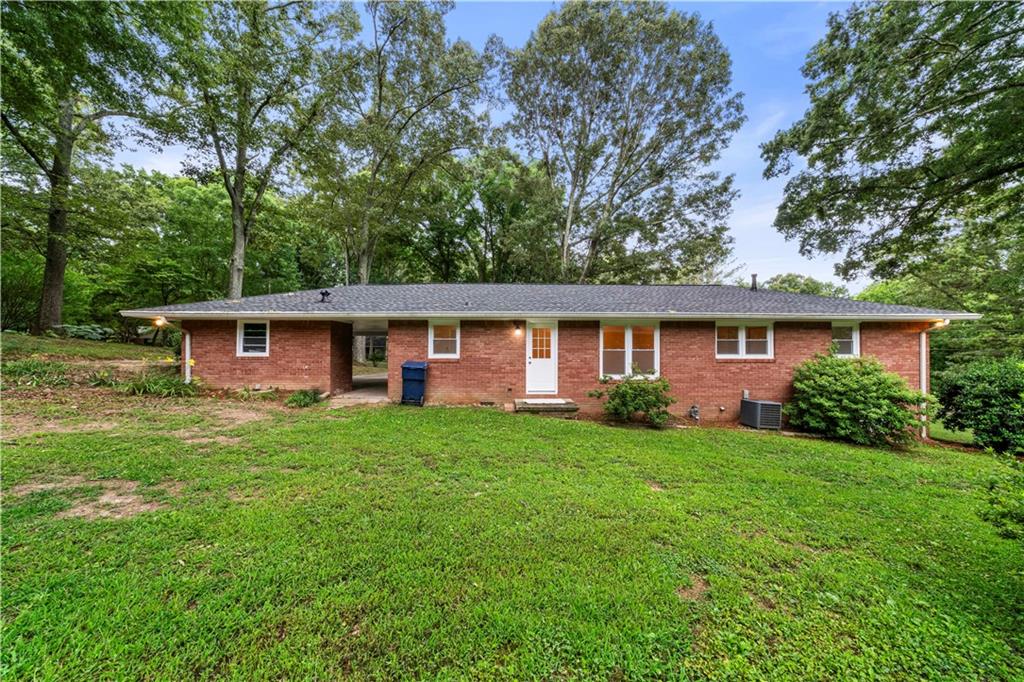 23 East Camelia Road Northeast Rome, GA 30161 - Photo 24 of 27 front view of a house with a yard