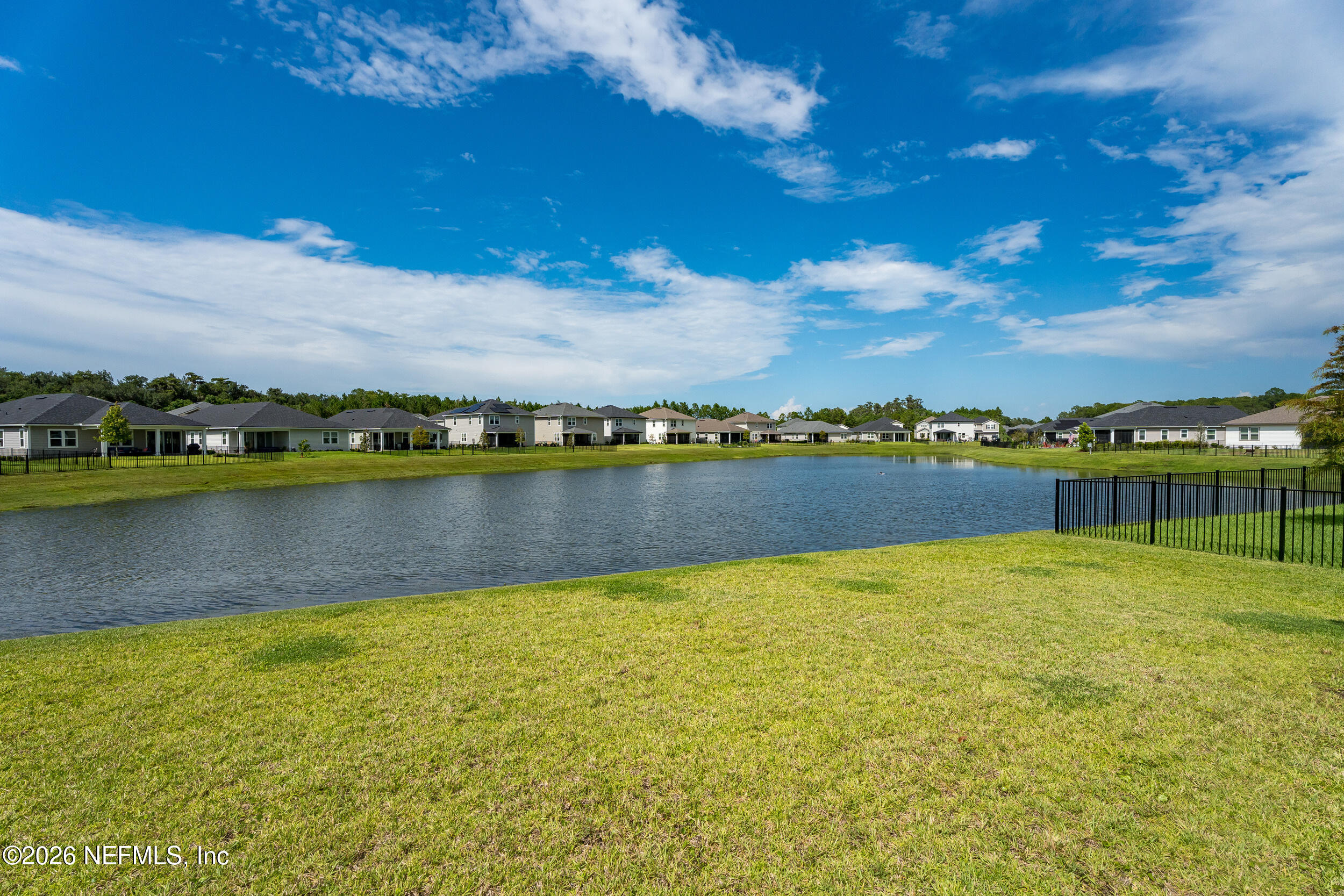 57 Cedar Elm Way St. Augustine, FL 32092 - Photo 43 of 65 a view of a city with swimming pool and lake