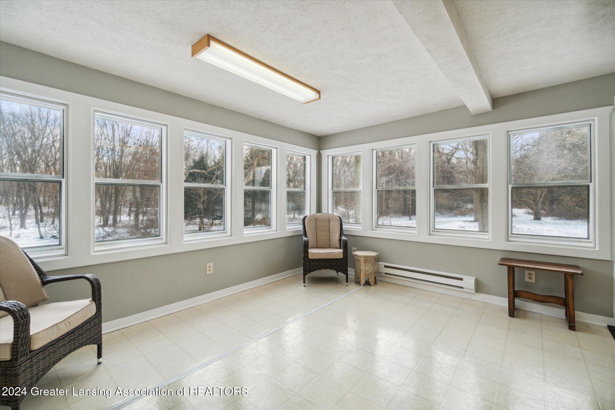 14725 Nichols Road Bath, MI 48808 - Photo 35 of 53 4 seasons room/elec heat