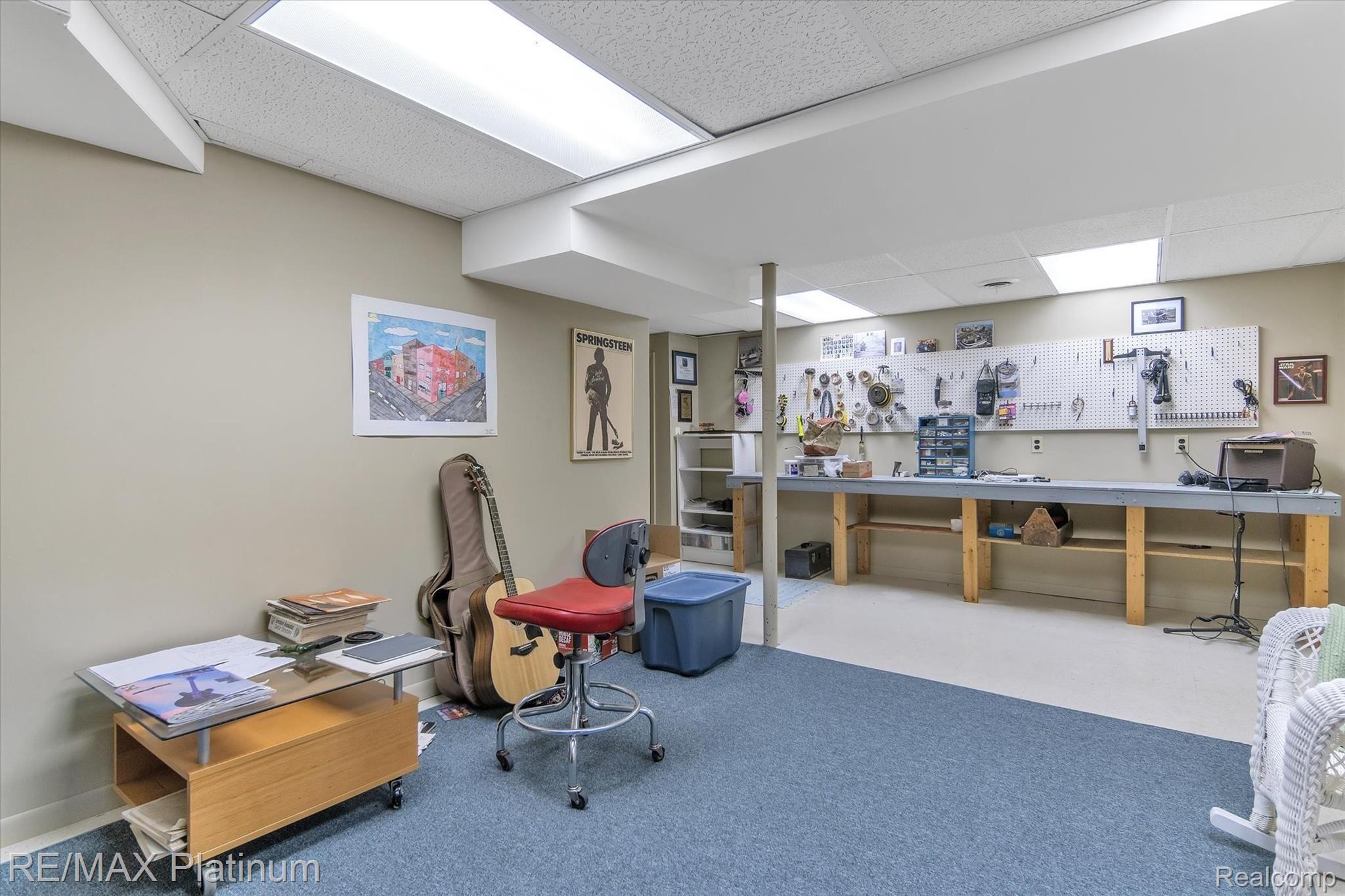 9193 Ravinewood Lane South Lyon, MI 48178 - Photo 24 of 26 24 - Basement Workroom.jpg
