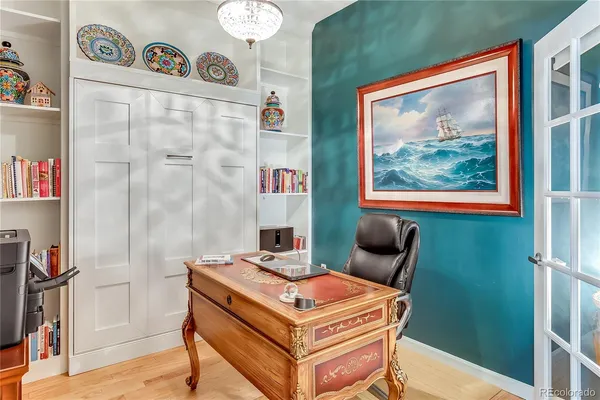 a living room with furniture and a gate