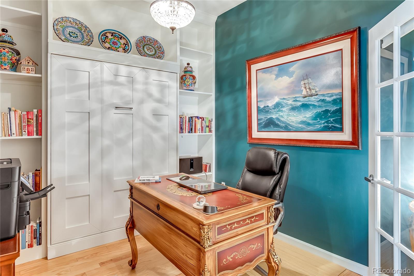 1950 Logan Street, Unit 814 Denver, CO 80203 - Photo 1 of 16 a living room with furniture and a gate