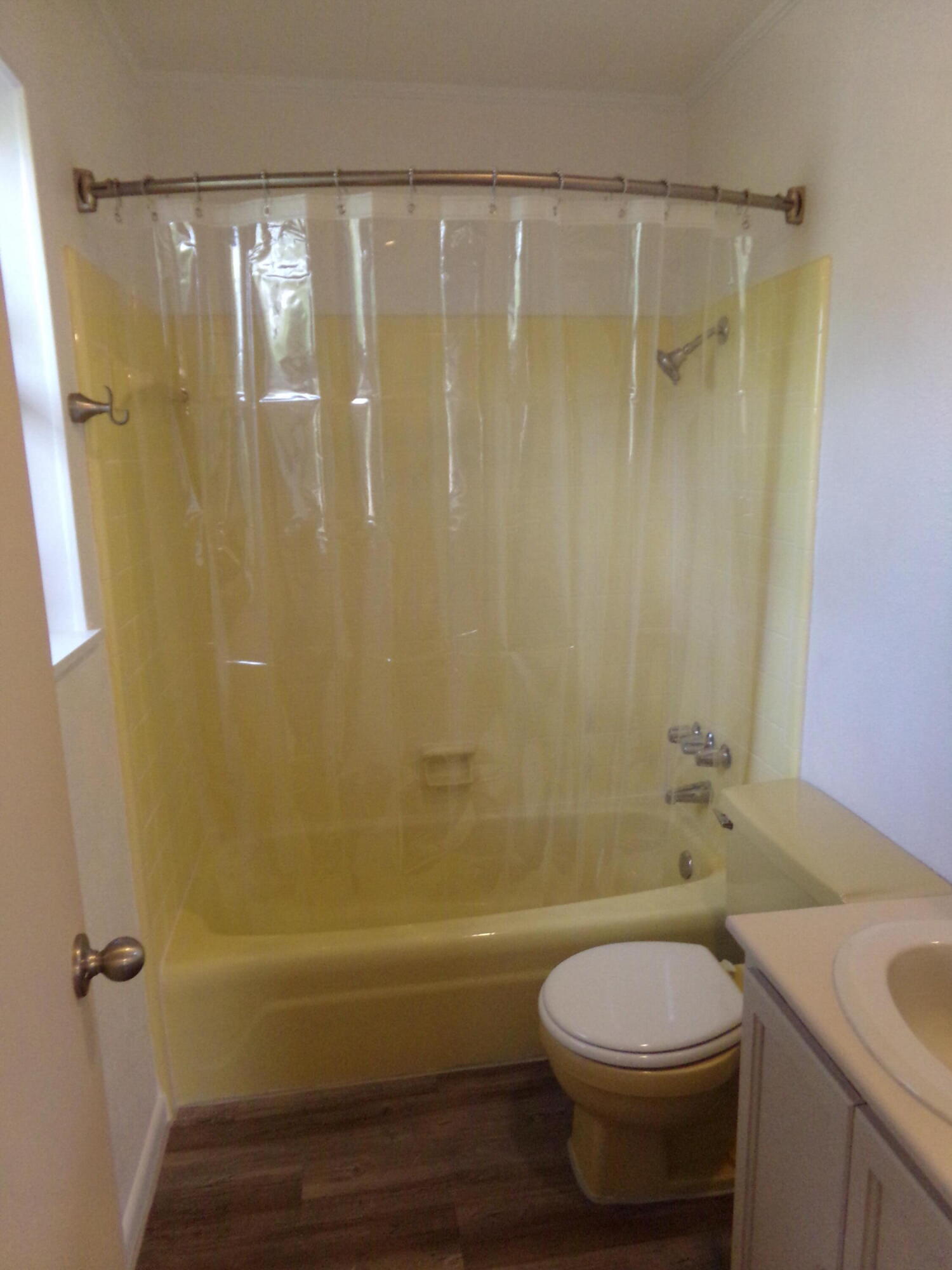4071 Painter Branch Road Crestview, FL 32539 - Photo 18 of 64 a bathroom with a shower a toilet and a sink