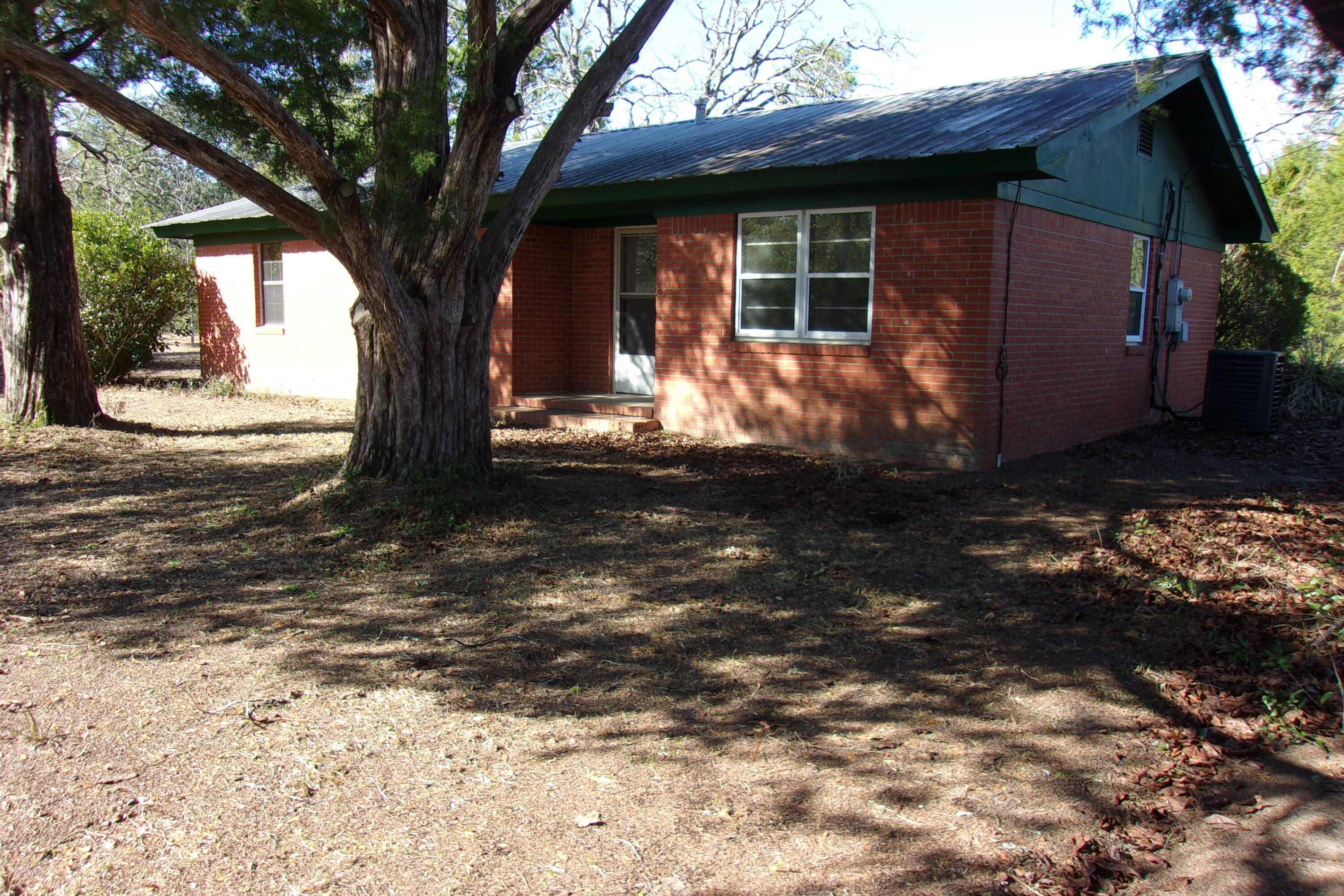 4071 Painter Branch Road Crestview, FL 32539 - Photo 9 of 64 a front view of a house with garden