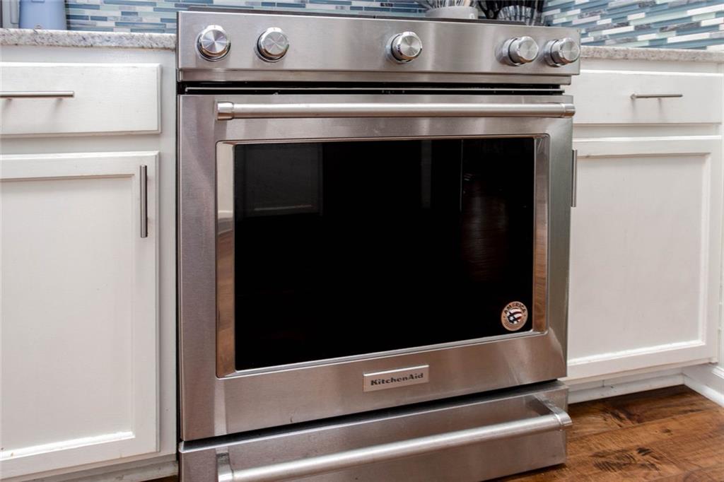 31 Abbey Lane Cartersville, GA 30120 - Photo 15 of 34 a stove top oven sitting inside of a kitchen