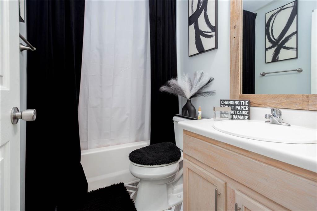 31 Abbey Lane Cartersville, GA 30120 - Photo 20 of 34 a bathroom with a toilet and a sink