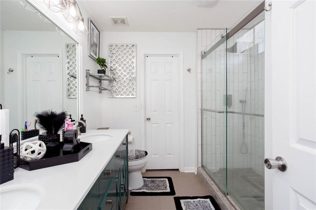 31 Abbey Lane Cartersville, GA 30120 - Photo 23 of 34 a view of a bathroom with a sink