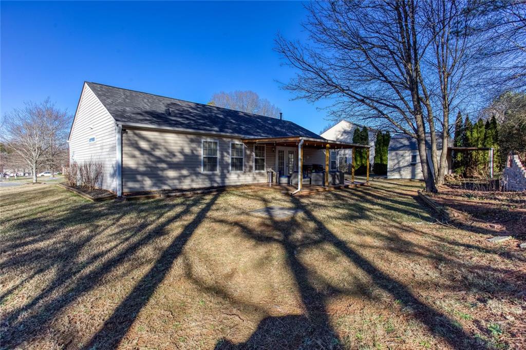 31 Abbey Lane Cartersville, GA 30120 - Photo 26 of 34 a view of a yard with wooden fence