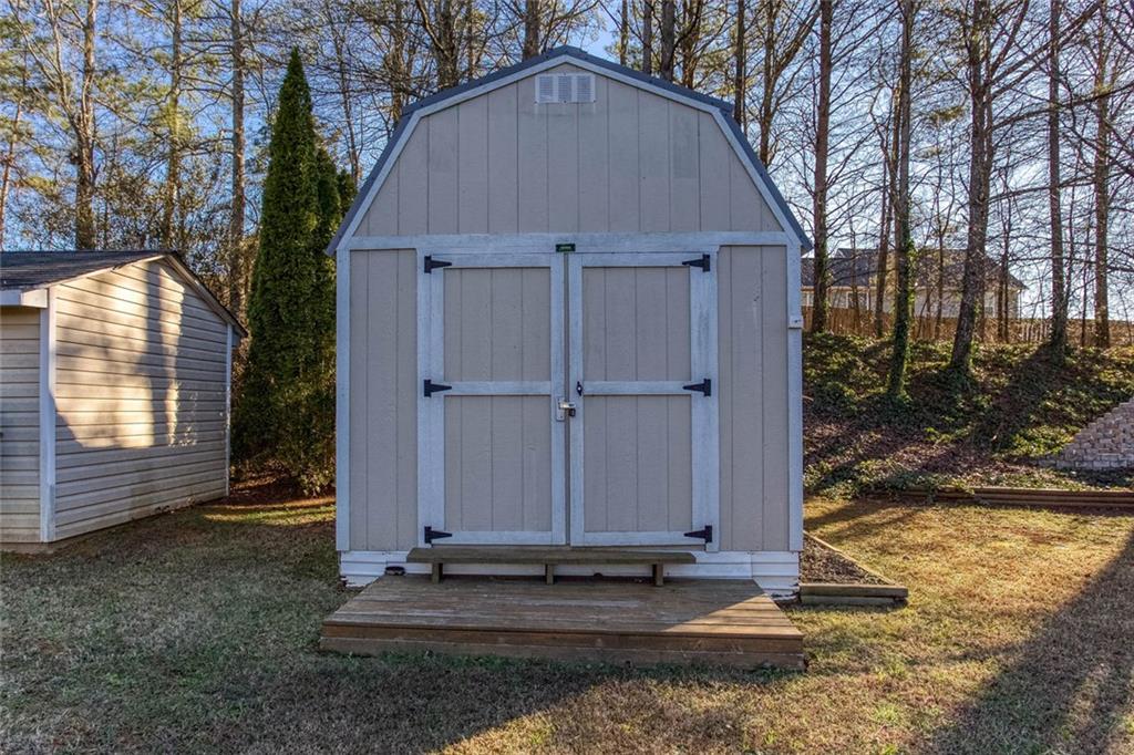 31 Abbey Lane Cartersville, GA 30120 - Photo 27 of 34 a view of a house with backyard