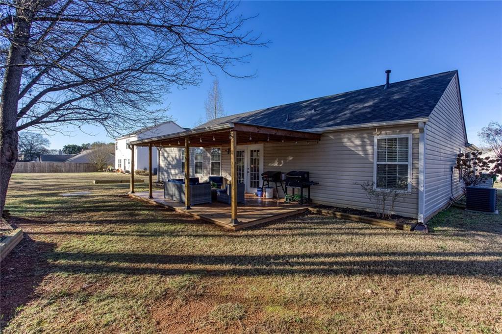 31 Abbey Lane Cartersville, GA 30120 - Photo 28 of 34 a view of a house with a yard