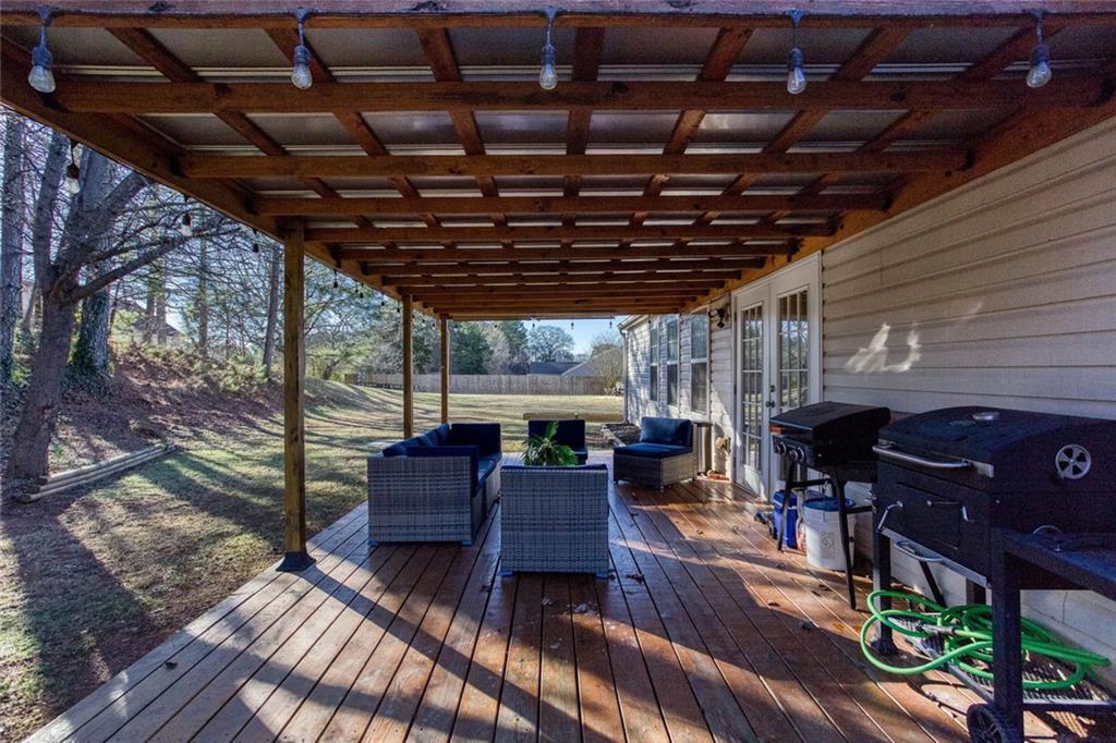 31 Abbey Lane Cartersville, GA 30120 - Photo 29 of 34 a view of a couches chair and wooden floor