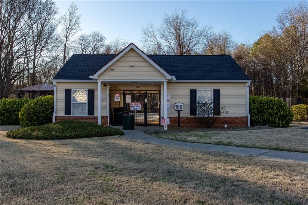 31 Abbey Lane Cartersville, GA 30120 - Photo 30 of 34 a front view of a house with garden