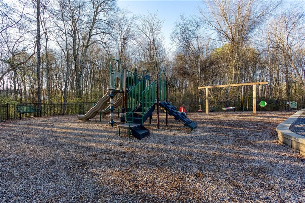 31 Abbey Lane Cartersville, GA 30120 - Photo 32 of 34 a view of outdoor space with playground and green space
