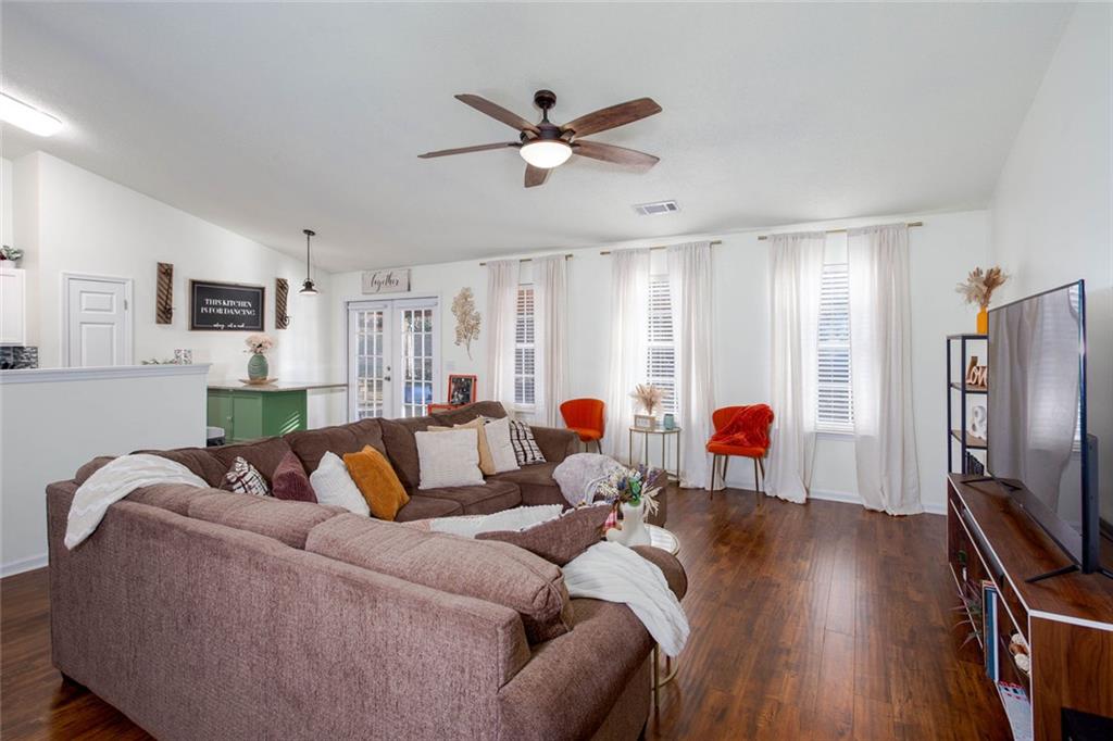 31 Abbey Lane Cartersville, GA 30120 - Photo 8 of 34 a living room with furniture kitchen view and a window