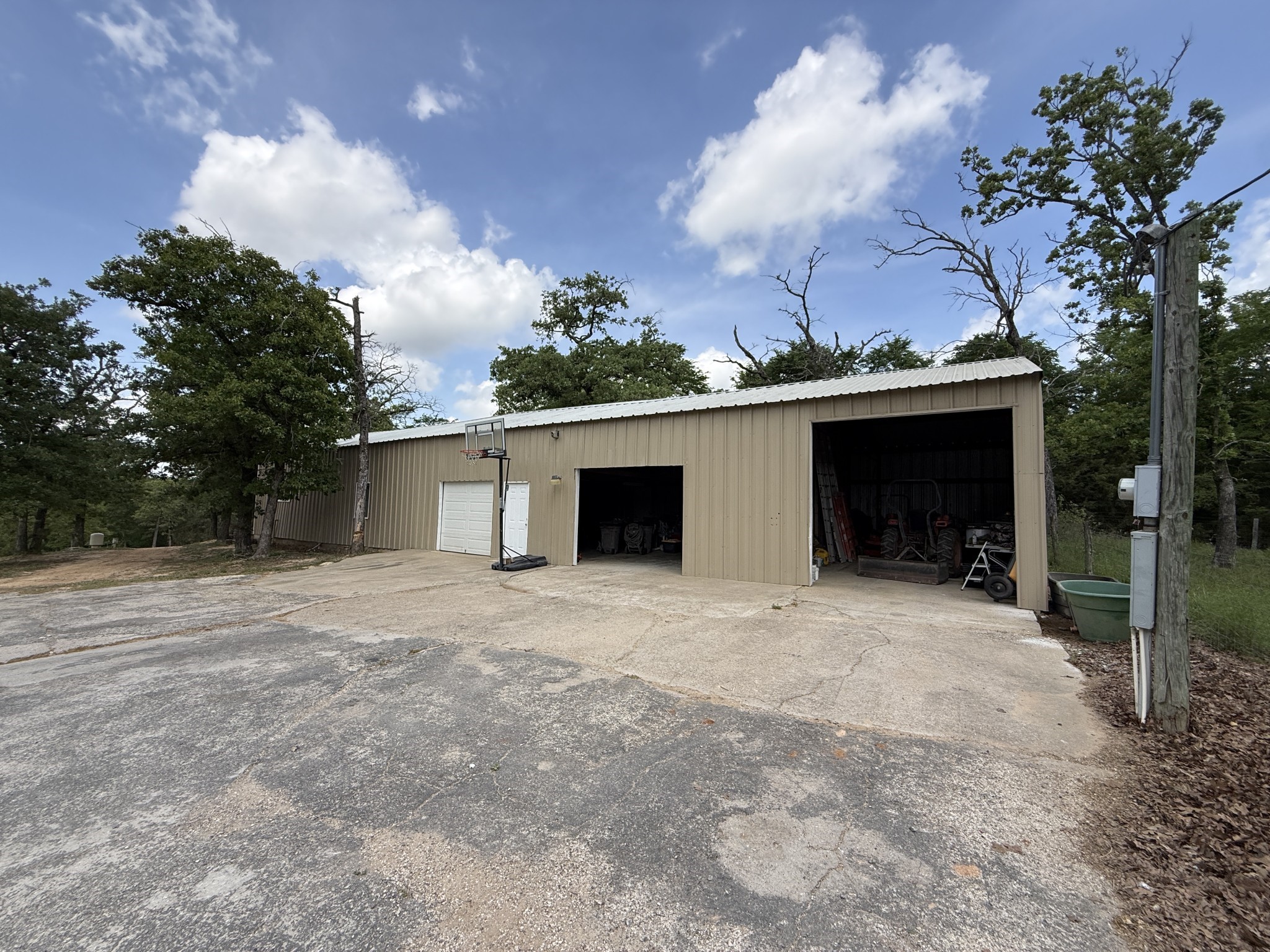 740 Bridget Avenue Buffalo, TX 75831 - Photo 48 of 50 a front view of a house with a yard and garage