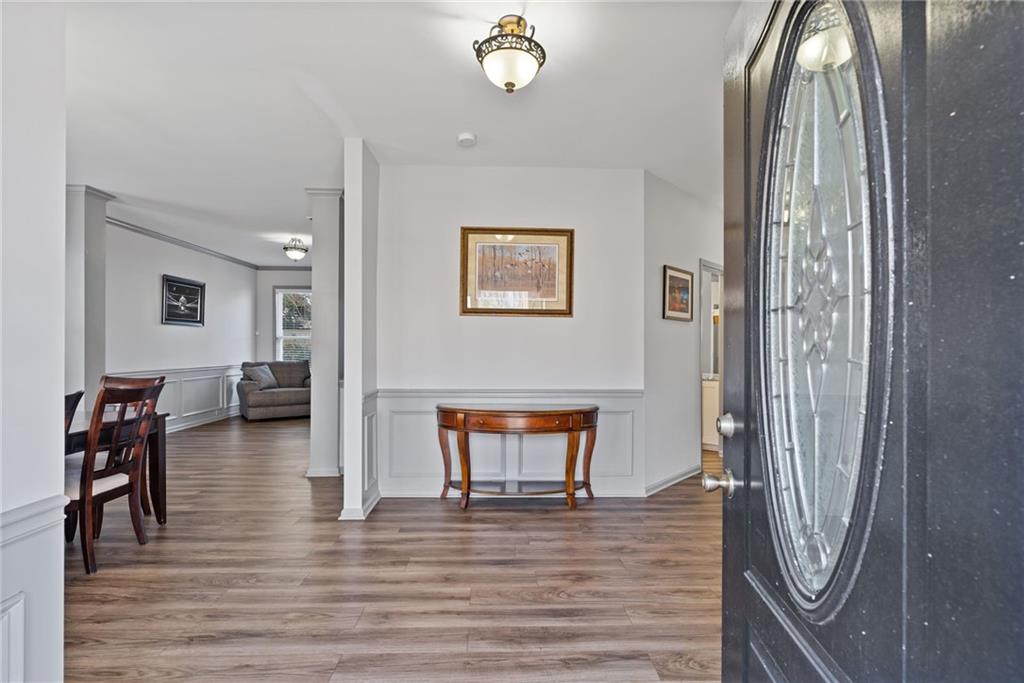 232 Springs Crossing Canton, GA 30114 - Photo 11 of 57 a view of livingroom with furniture and wooden floor