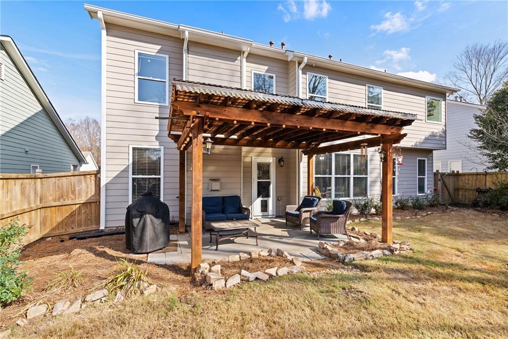 232 Springs Crossing Canton, GA 30114 - Photo 51 of 57 a view of a house with patio