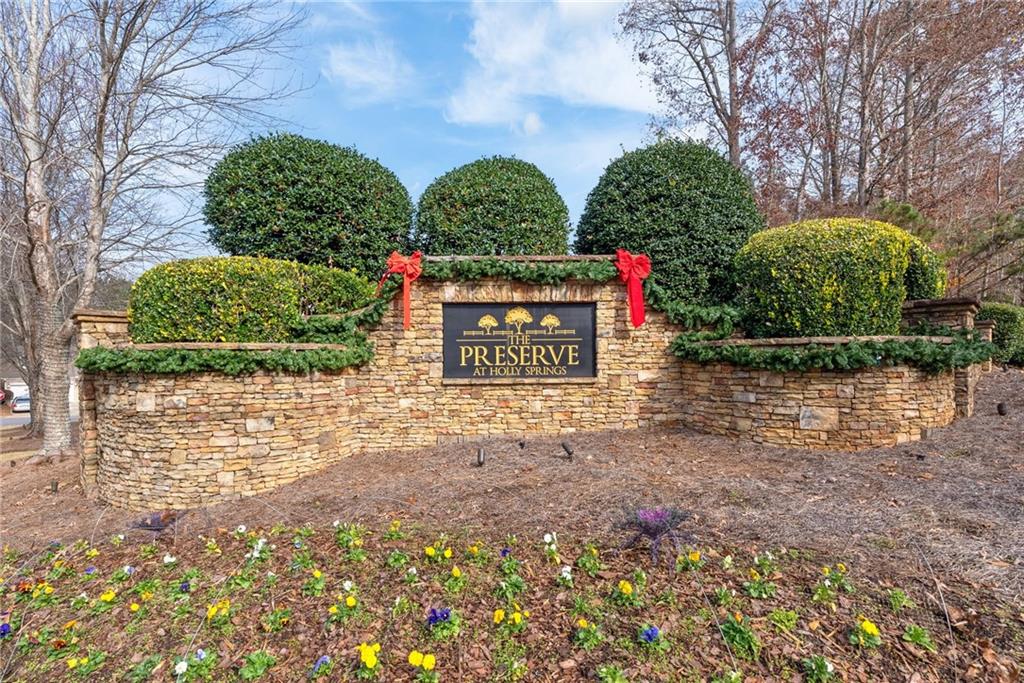 232 Springs Crossing Canton, GA 30114 - Photo 6 of 57 a view of sign board