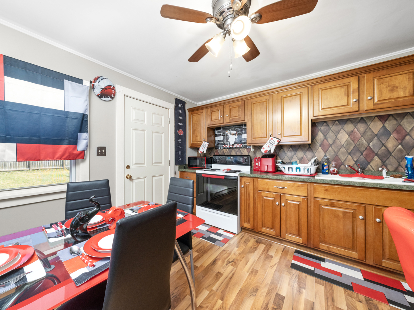 1446 Erie Street Ottawa, IL 61350 - Photo 12 of 41 a bedroom with a bed dresser and a window