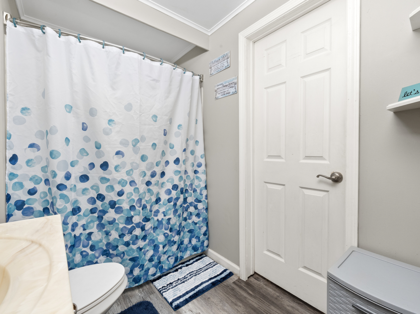 1446 Erie Street Ottawa, IL 61350 - Photo 24 of 41 a bathroom with a toilet and a shower curtain